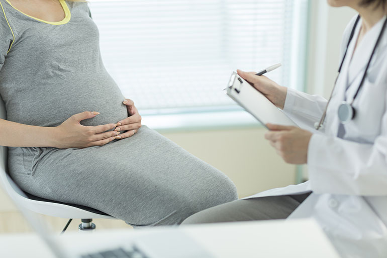 The pregnant woman who has an examination
