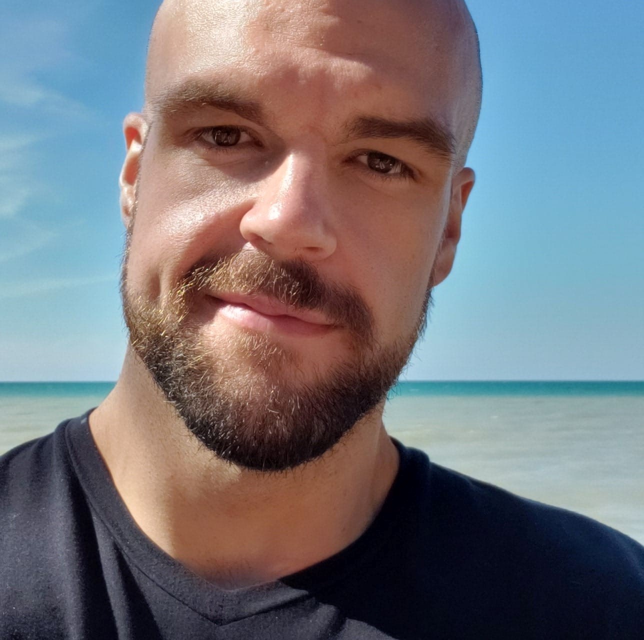 A photo shows Jacob Elert posing for a selfie.