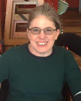 A photo of Ingrid Tischer posing for a portrait.