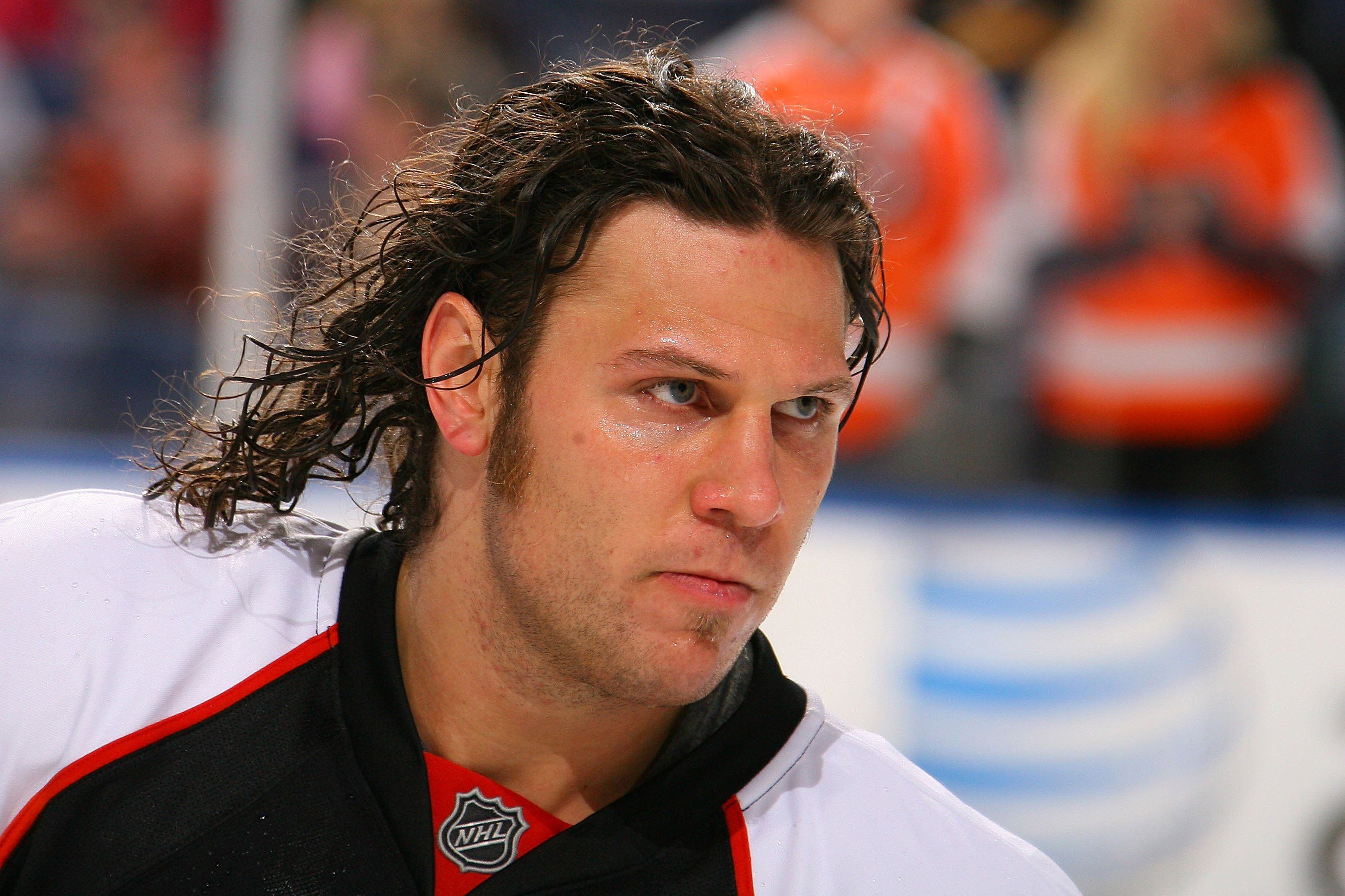 A photo of a younger Riley Cote skating before a hockey match in 2009.