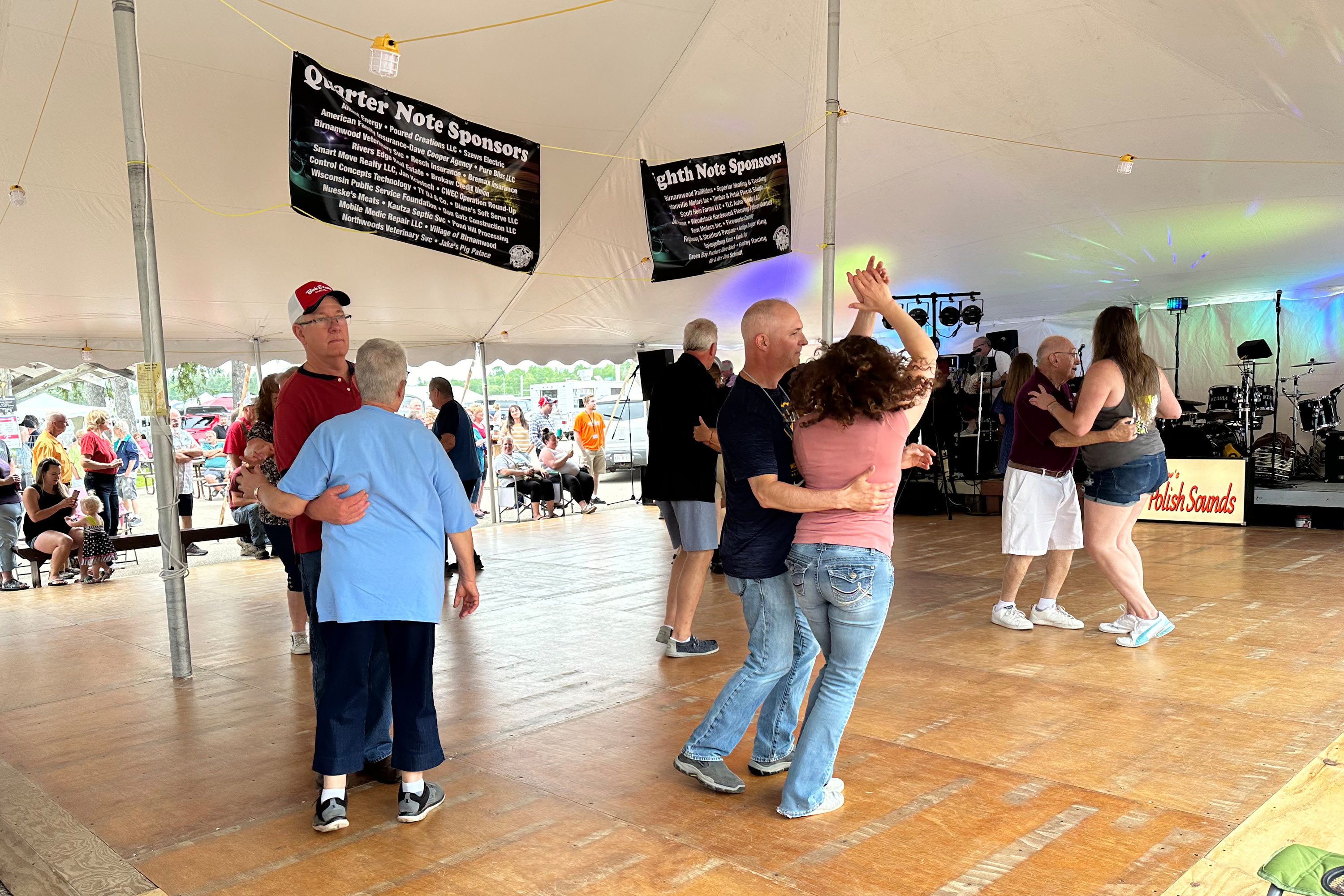 A photo of couples dancing.