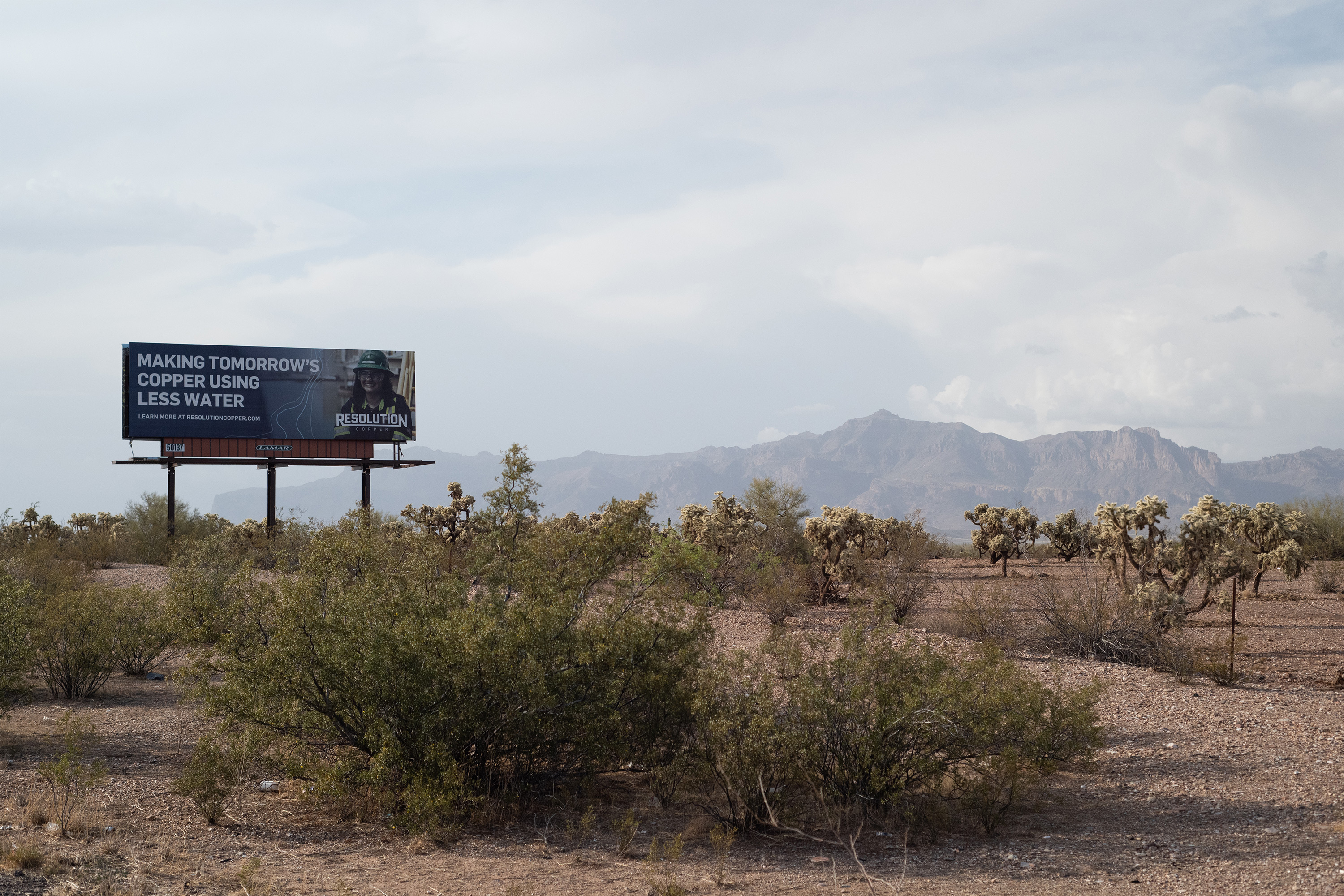 A photo of a billboard sign that reads, "Making tomorrow's copper using less water."